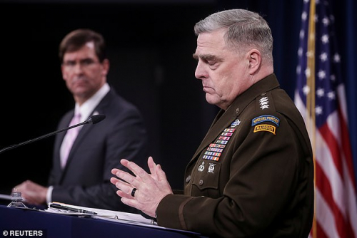 U.S. Joint Chiefs Chairman Army Gen. Mark Milley addresses a news conference as Defense Secretary Mark Esper listens at the Pentagon in Arlington, Virginia on Thursday