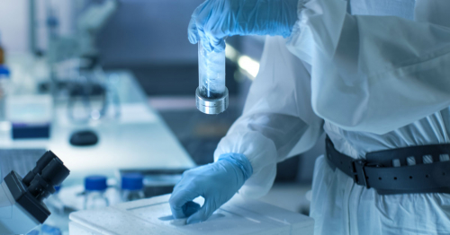 Medical Scientist Works in Hazmat Suit